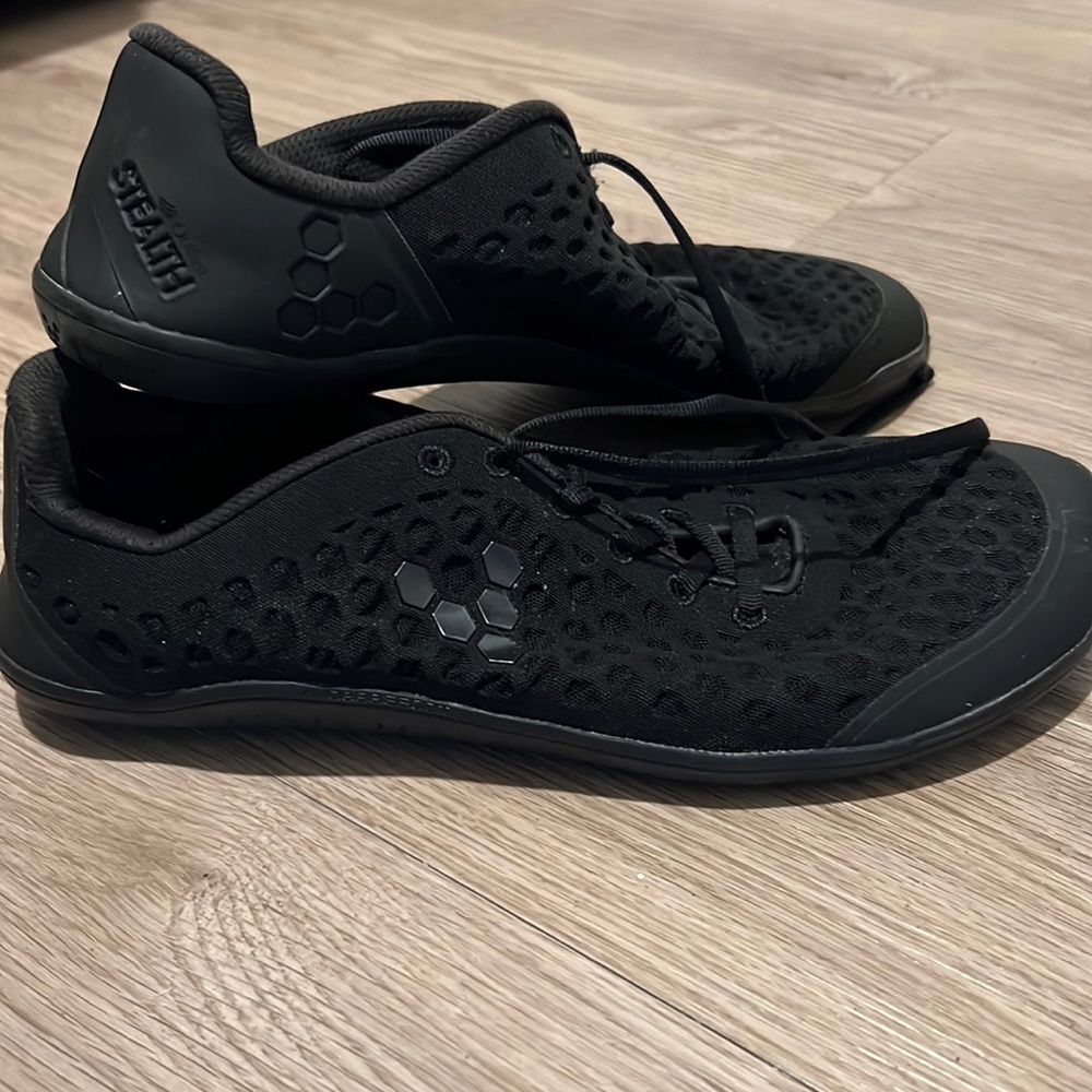 Like New Vivobarefoot Stealth. All black.